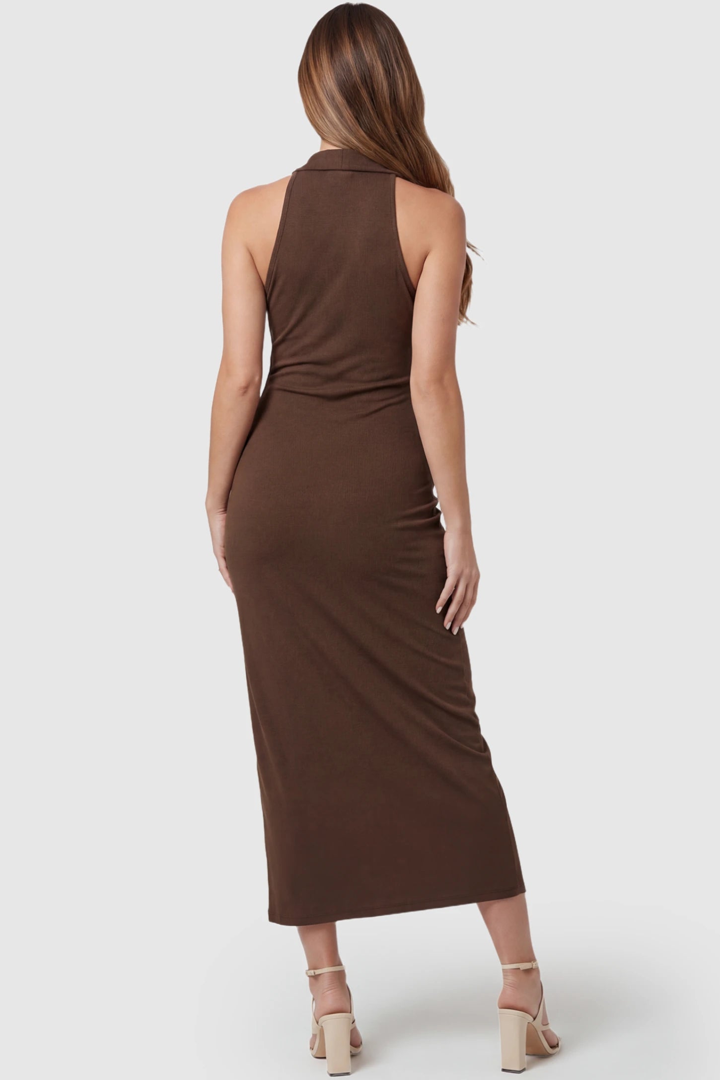 Twist Front Halter Neck Maternity Maxi Dress Twist Front Halter Neck Maternity Maxi Dress in Coffee featuring breathable cotton knit fabric, high-cut racerback on a pregnant model, back view.