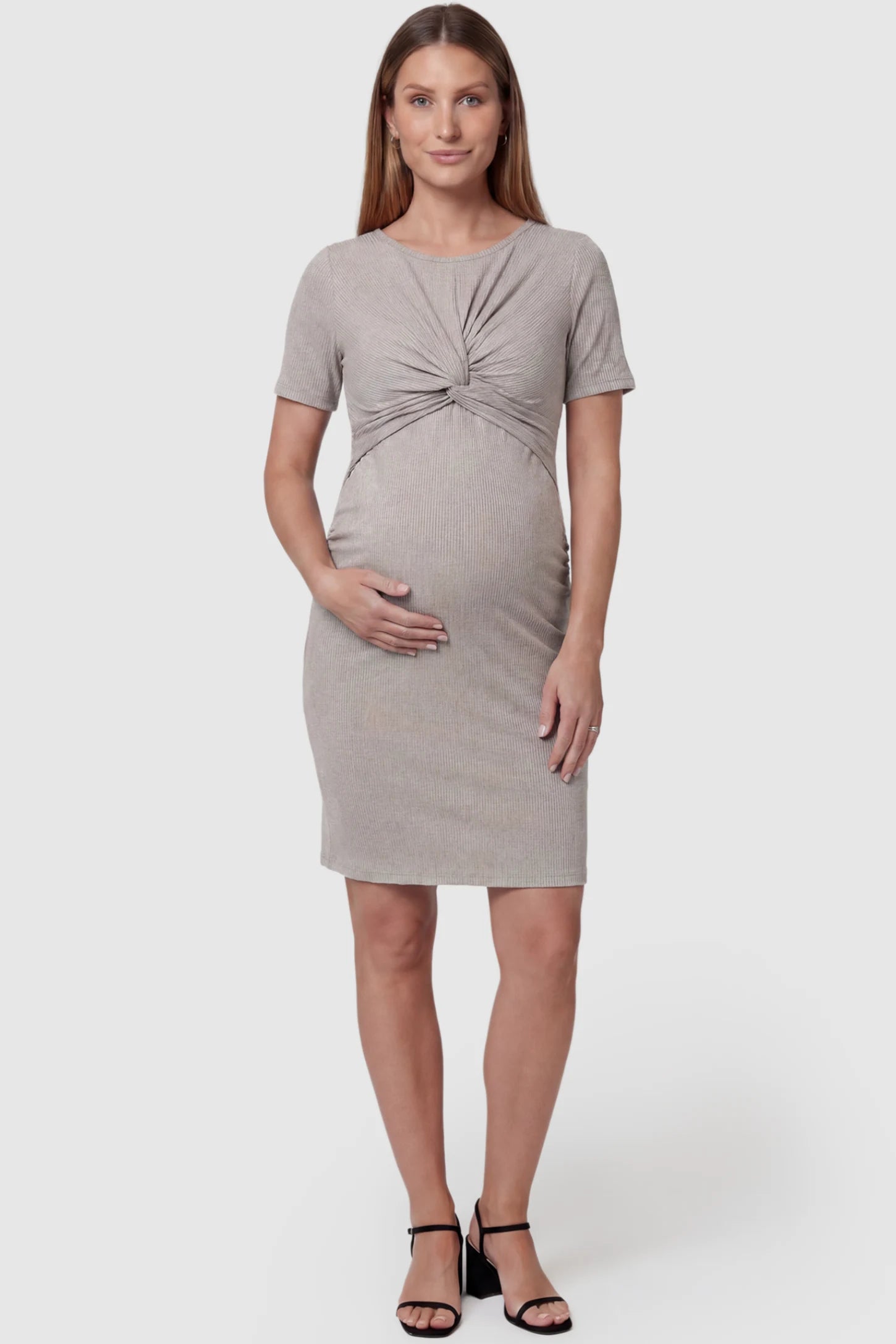 Twist Front Round Neck Short Sleeve Maternity Short Dress Twist Front Round Neck Maternity Short Dress in gray featuring side ruched panels on a pregnant model, front view.