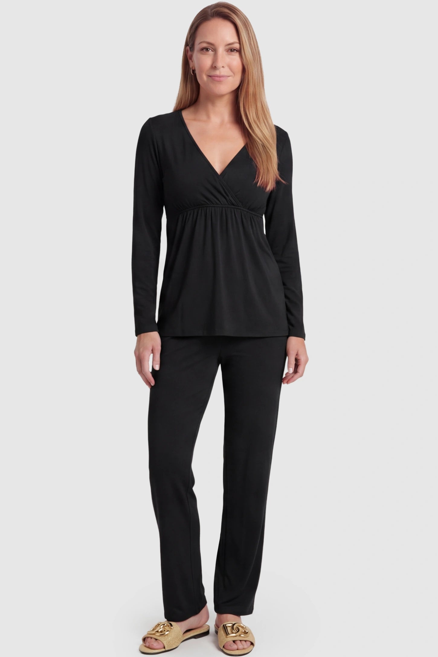 V-Neck Long Sleeve Top with Long Pants Maternity Sleepwear V-Neck Long Sleeve Maternity Lounge Set in Black featuring a crossover front on a postpartum model showing front.
