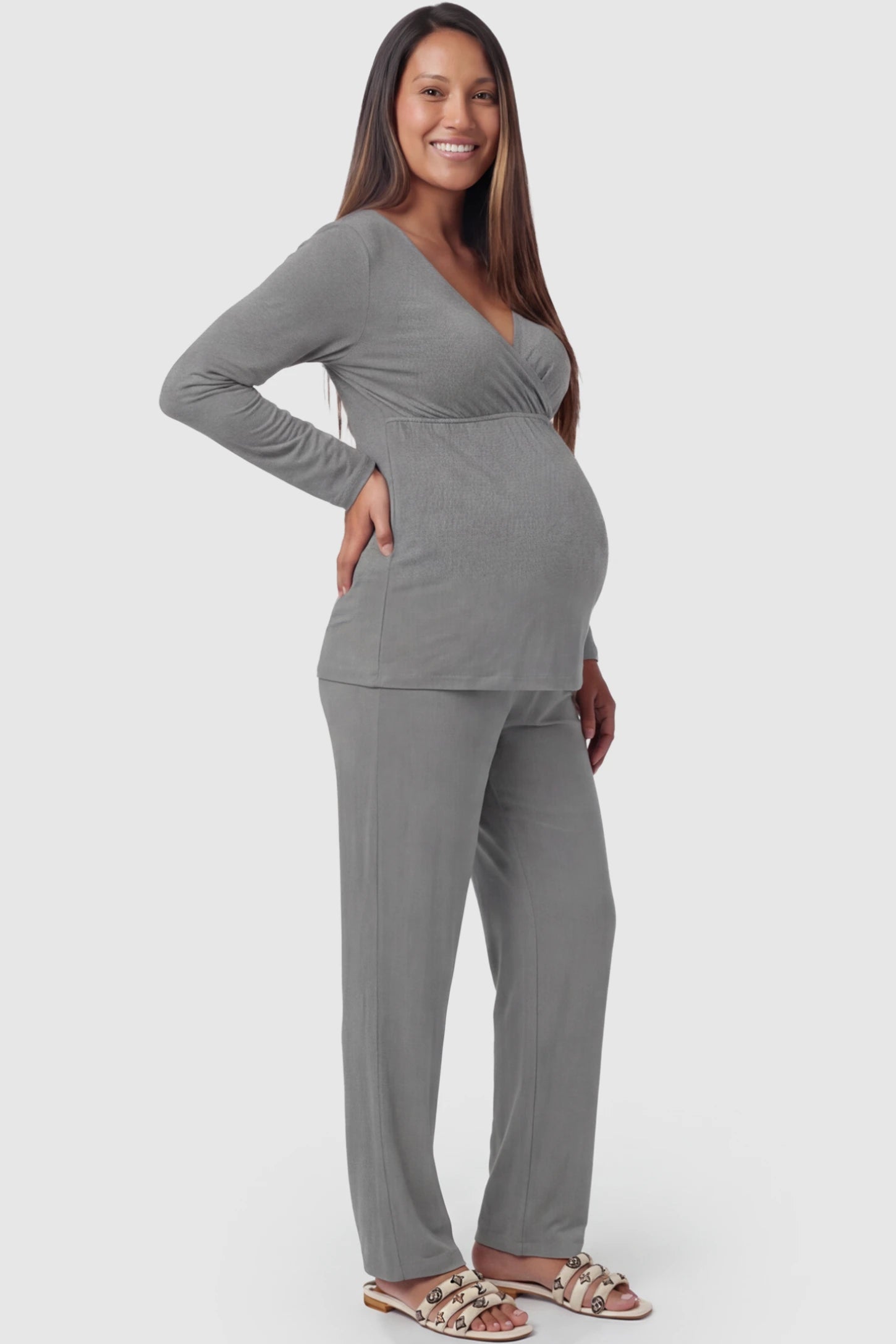 V-Neck Long Sleeve Top with Long Pants Maternity Sleepwear V-Neck Long Sleeve Maternity Lounge Set in Gray featuring a crossover front on a pregnant model showing side.