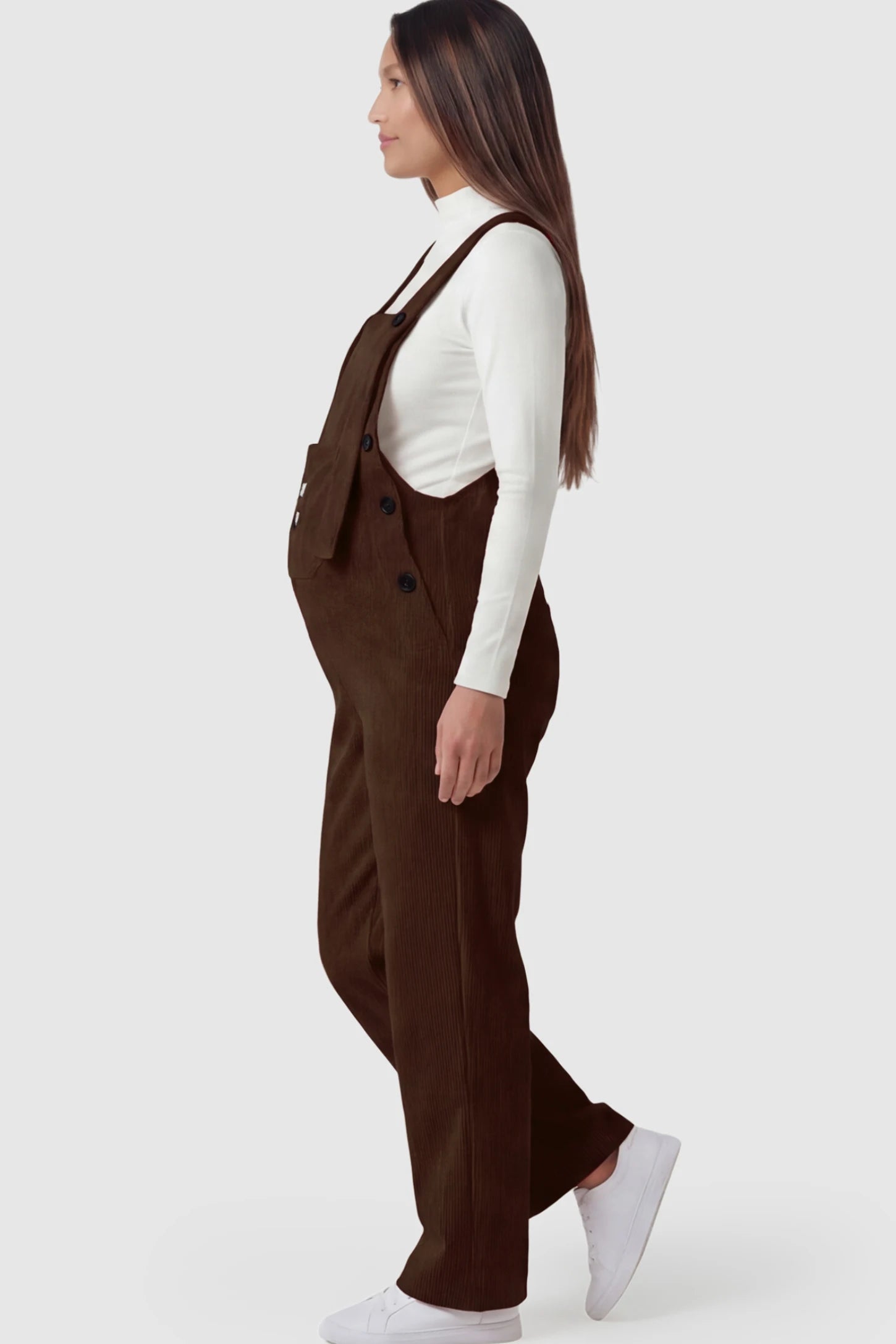 Adjustable Strap Wide-Leg Corduroy Maternity Overalls Floral Embroidered Wide-Leg Maternity Overalls in brown featuring adjustable straps on a pregnant model showing side.