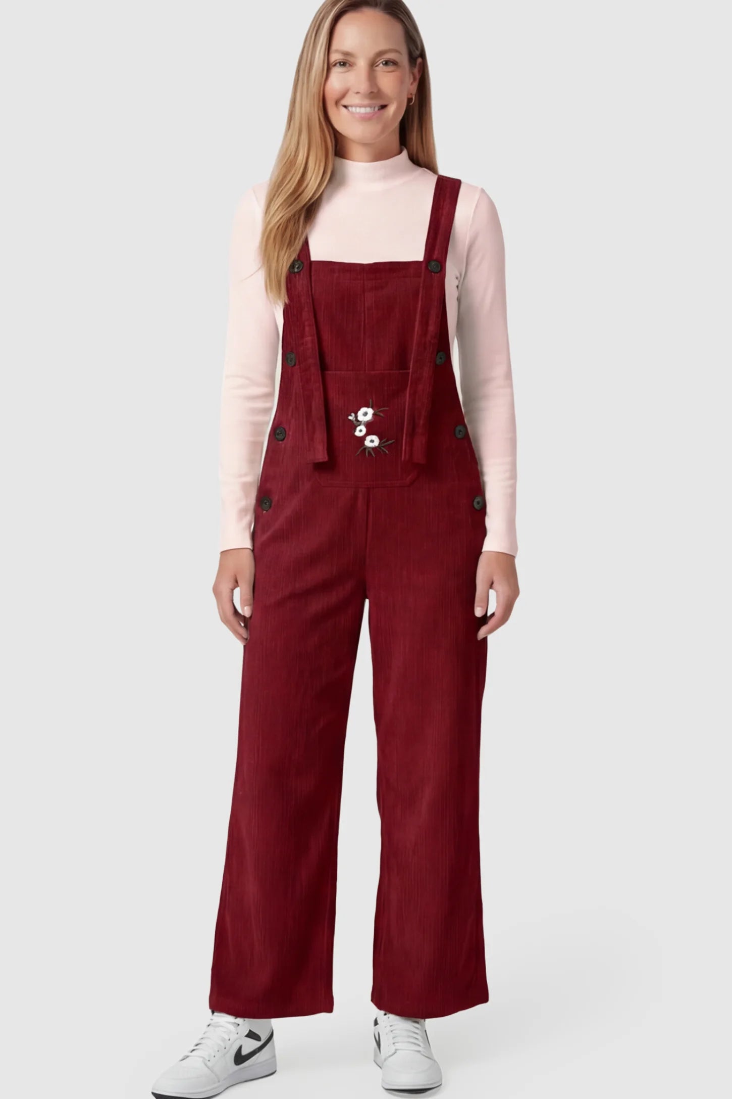 Adjustable Strap Wide-Leg Corduroy Maternity Overalls Floral Embroidered Wide-Leg Maternity Overalls in red featuring adjustable straps on a postpartum model.