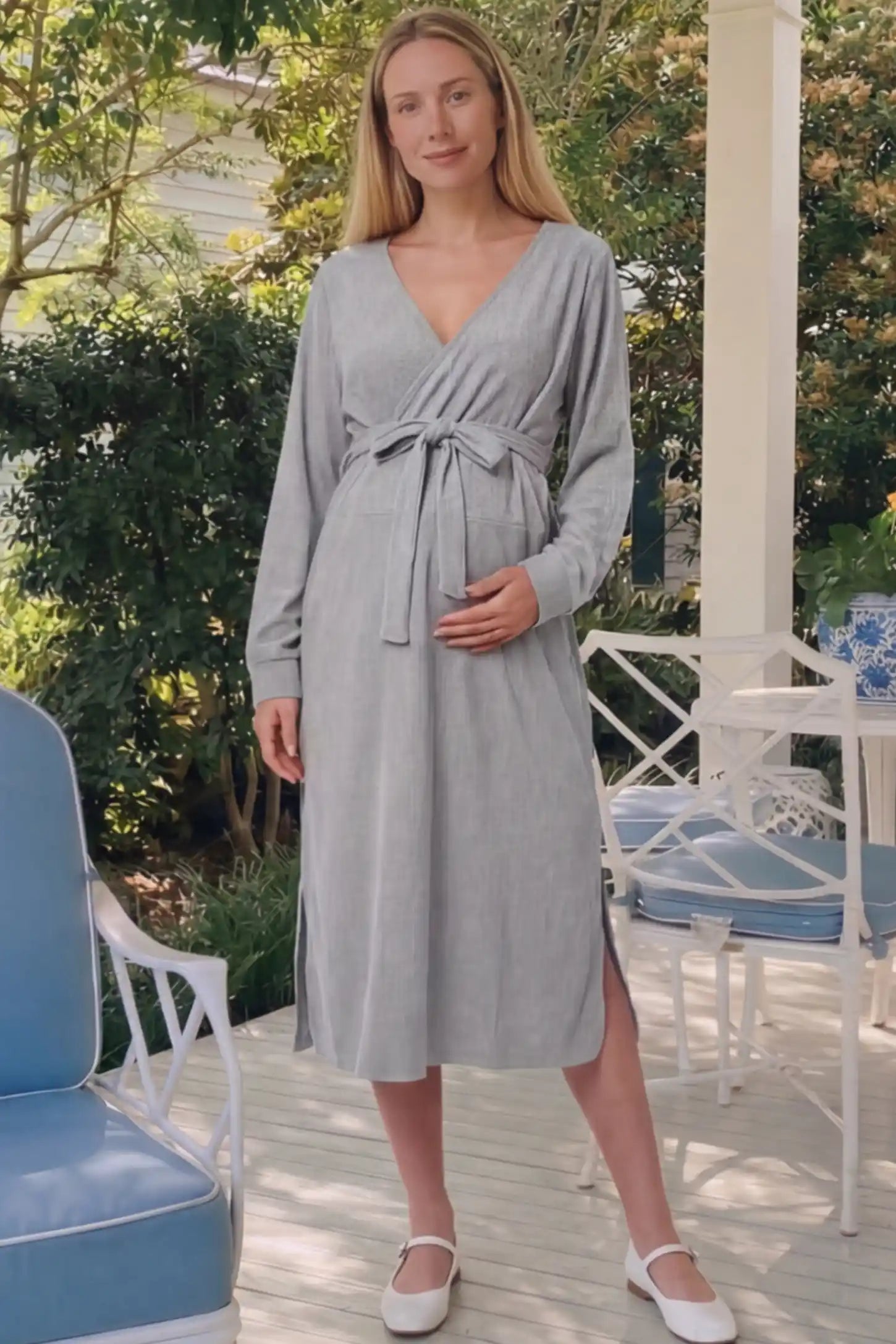 Wrap Front Tie Waist Long Sleeve Maternity Midi Dress Wrap Front Tie Waist Long Sleeve Maternity Midi Dress in Gray featuring adjustable tie waist and side slits on a pregnant woman in outdoor setting, front view.