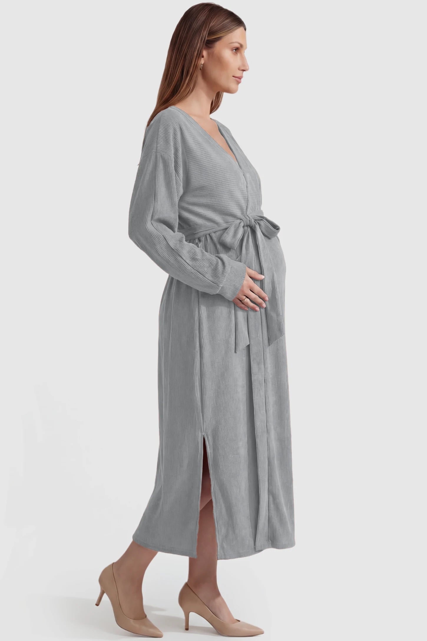 Wrap Front Tie Waist Long Sleeve Maternity Midi Dress Wrap Front Tie Waist Long Sleeve Maternity Midi Dress in Gray featuring adjustable tie waist and side slits on a pregnant model, side view.