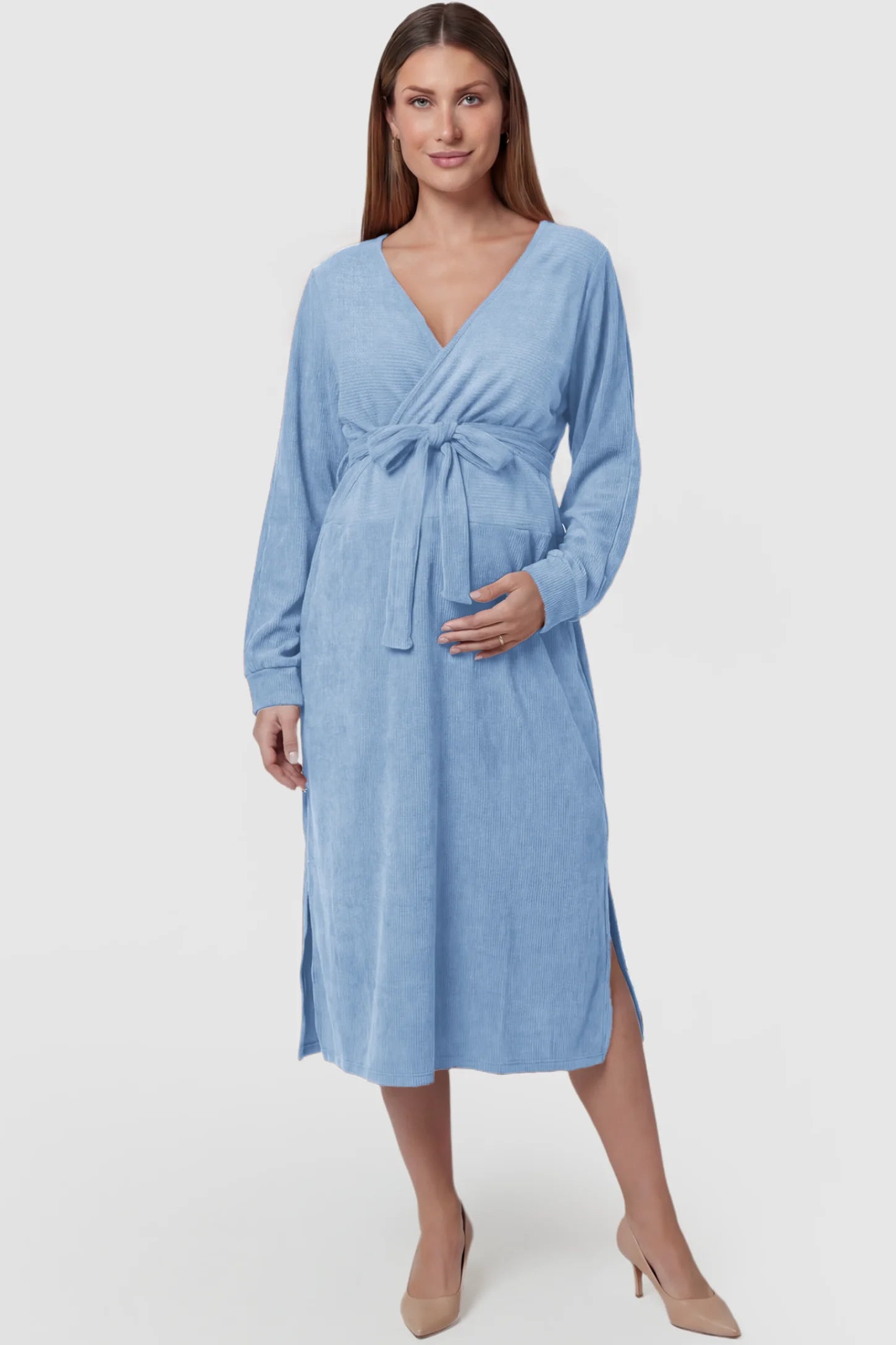 Wrap Front Tie Waist Long Sleeve Maternity Midi Dress Wrap Front Tie Waist Long Sleeve Maternity Midi Dress in Light Blue featuring adjustable tie waist and side slits on a pregnant model, front view.