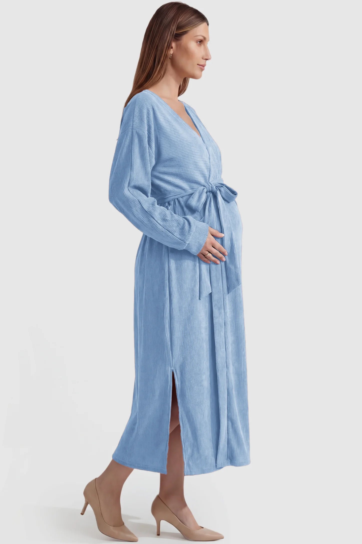 Wrap Front Tie Waist Long Sleeve Maternity Midi Dress Wrap Front Tie Waist Long Sleeve Maternity Midi Dress in Light Blue featuring adjustable tie waist and side slits on a pregnant model, side view.
