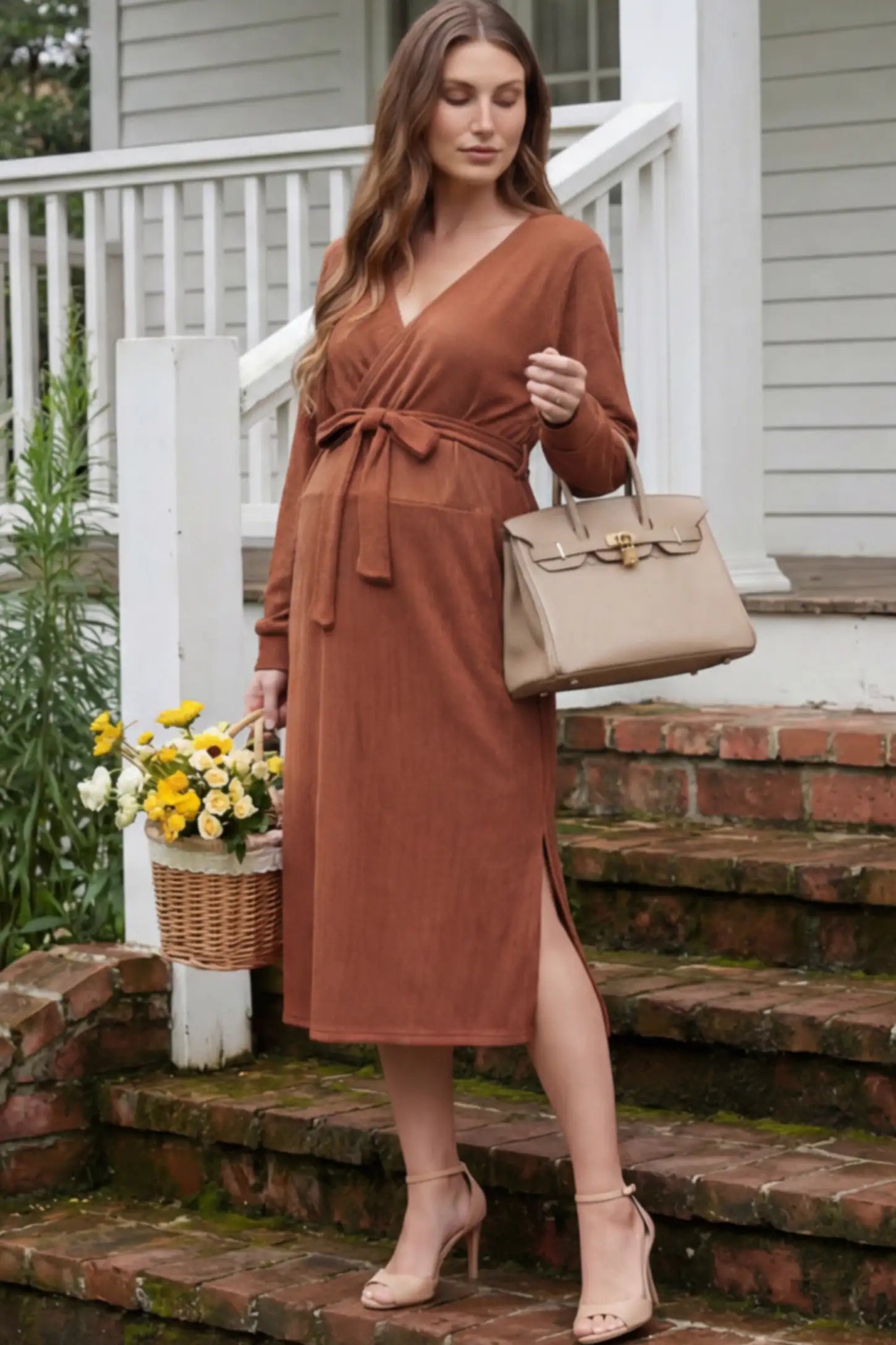 Wrap Front Tie Waist Long Sleeve Maternity Midi Dress Wrap Front Tie Waist Long Sleeve Maternity Midi Dress in Orange featuring adjustable tie waist and side slits on a pregnant woman in outdoor setting, front view.