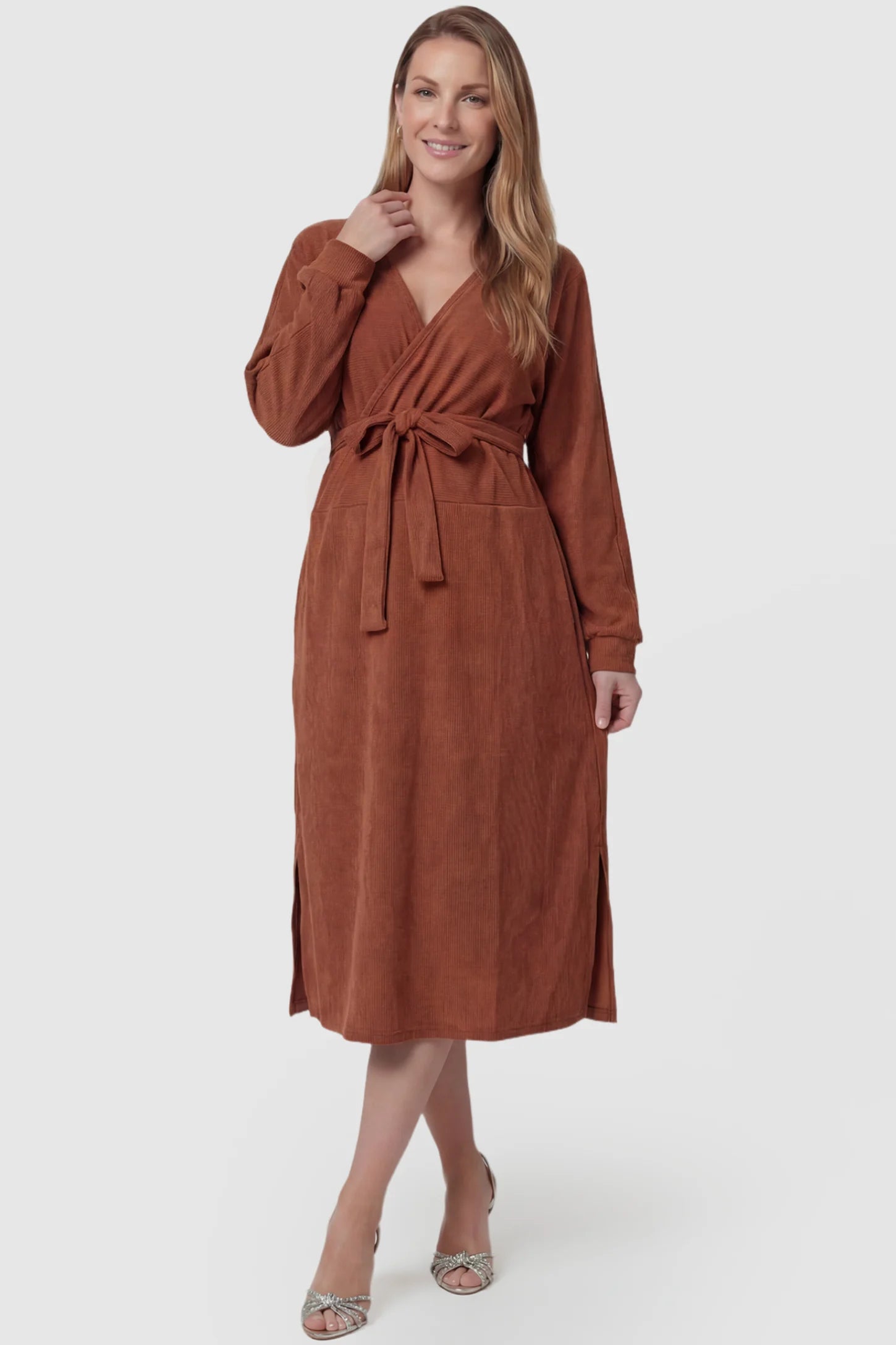 Wrap Front Tie Waist Long Sleeve Maternity Midi Dress Wrap Front Tie Waist Long Sleeve Maternity Midi Dress in Orange featuring adjustable tie waist and side slits on a postpartum model, front view.