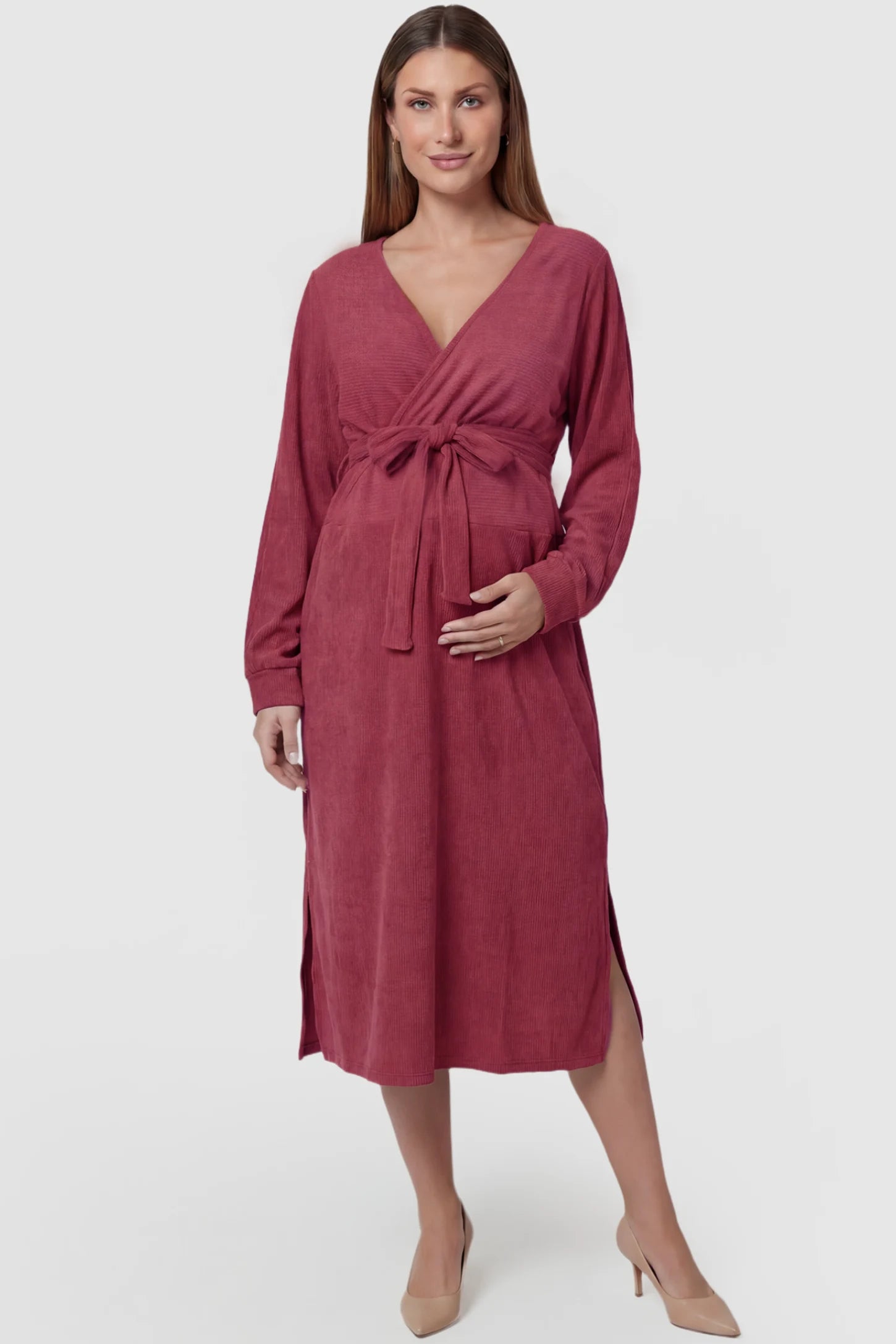 Wrap Front Tie Waist Long Sleeve Maternity Midi Dress Wrap Front Tie Waist Long Sleeve Maternity Midi Dress in Purple featuring adjustable tie waist and side slits on a pregnant model, front view.