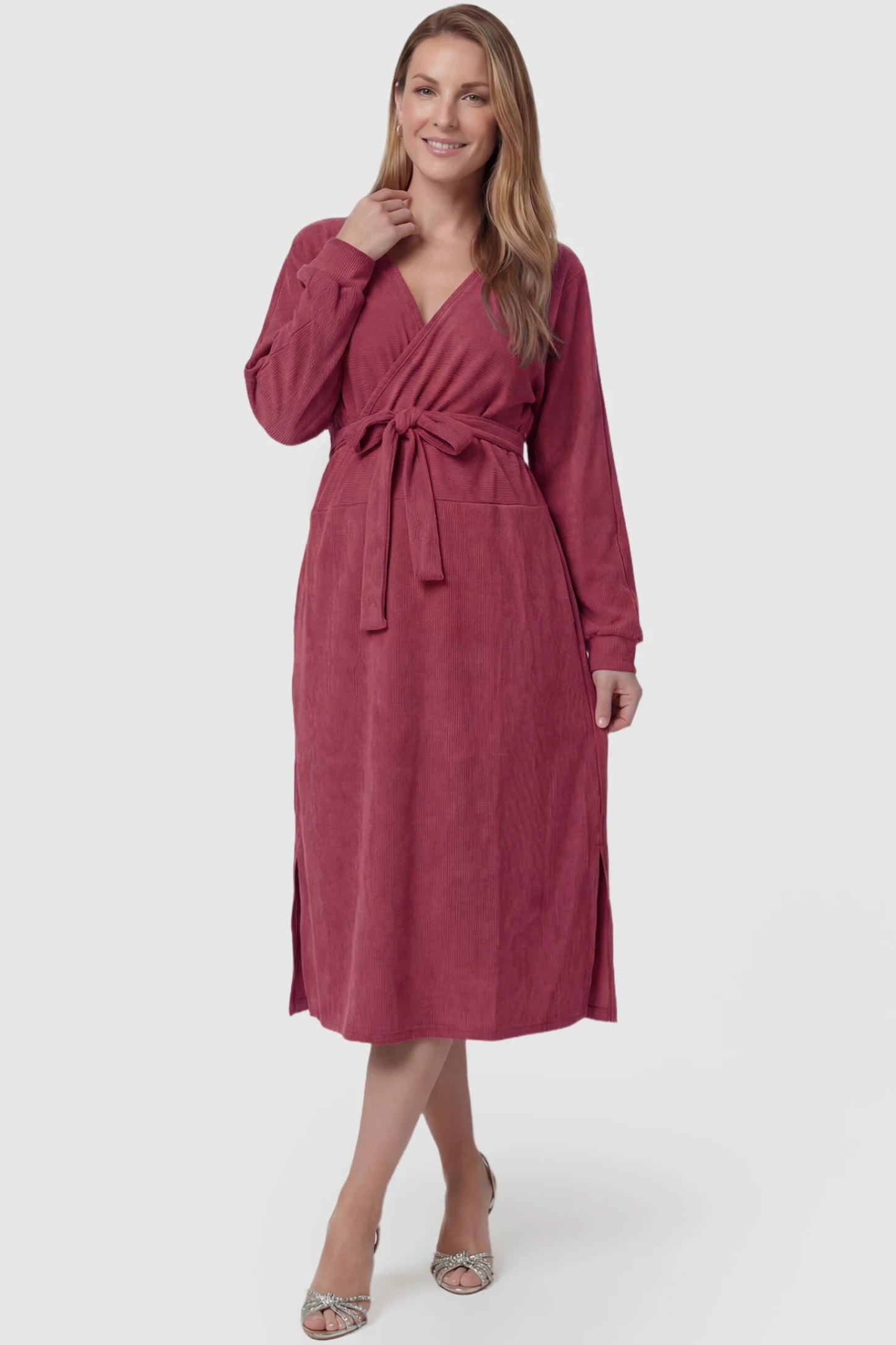 Wrap Front Tie Waist Long Sleeve Maternity Midi Dress Wrap Front Tie Waist Long Sleeve Maternity Midi Dress in Purple featuring adjustable tie waist and side slits on a postpartum model, front view.