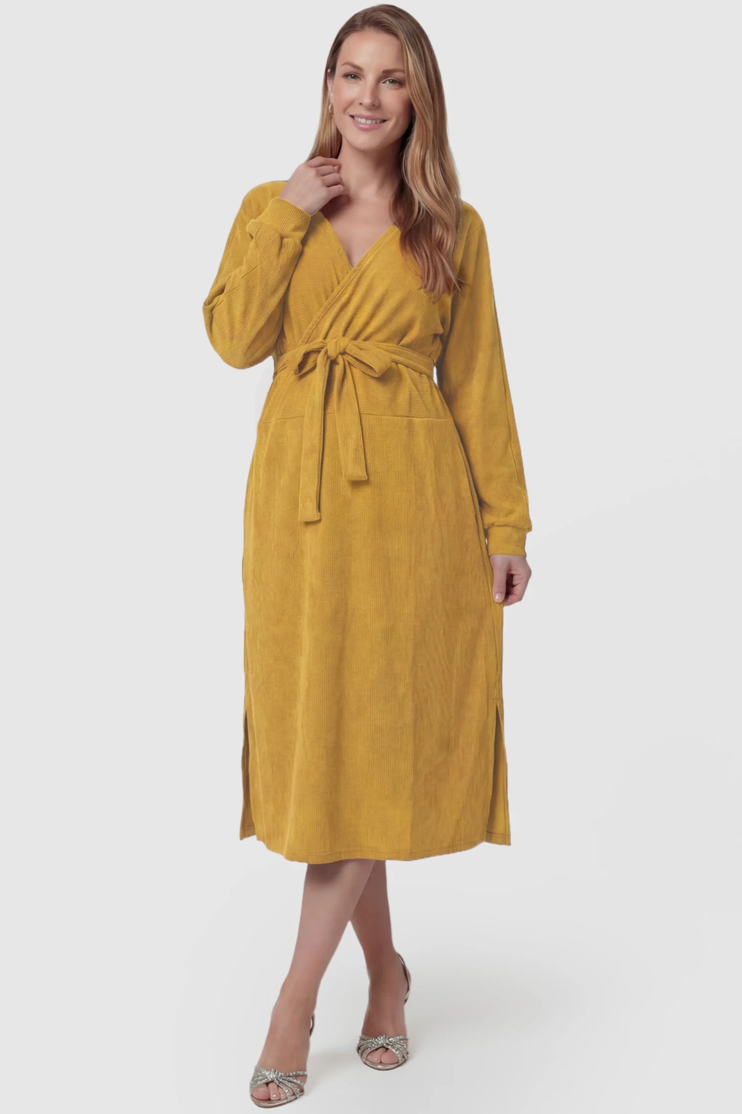 Wrap Front Tie Waist Long Sleeve Maternity Midi Dress Wrap Front Tie Waist Long Sleeve Maternity Midi Dress in Yellow featuring adjustable tie waist and side slits on a postpartum model, front view.