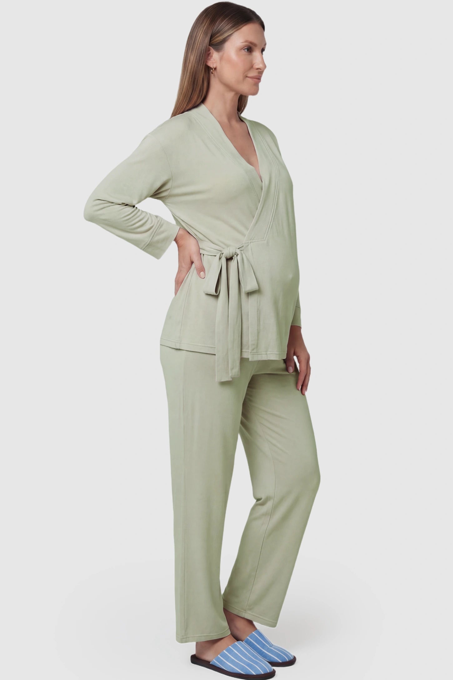 Cotton Wrap Front Long Sleeve Top Wide Leg Pants Maternity Sleepwear in Pale Olive featuring natural cotton fabric on a pregnant model showing side.