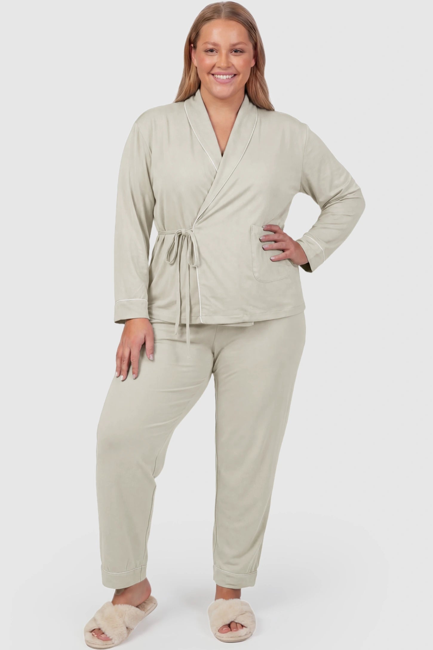 Cotton Wrap Front Long Sleeve Top Wide Leg Pants Maternity Sleepwear Cotton Wrap Front Long Sleeve Top Wide Leg Pants Maternity Sleepwear in light green featuring natural cotton fabric on a plus size pregnant model showing front.
