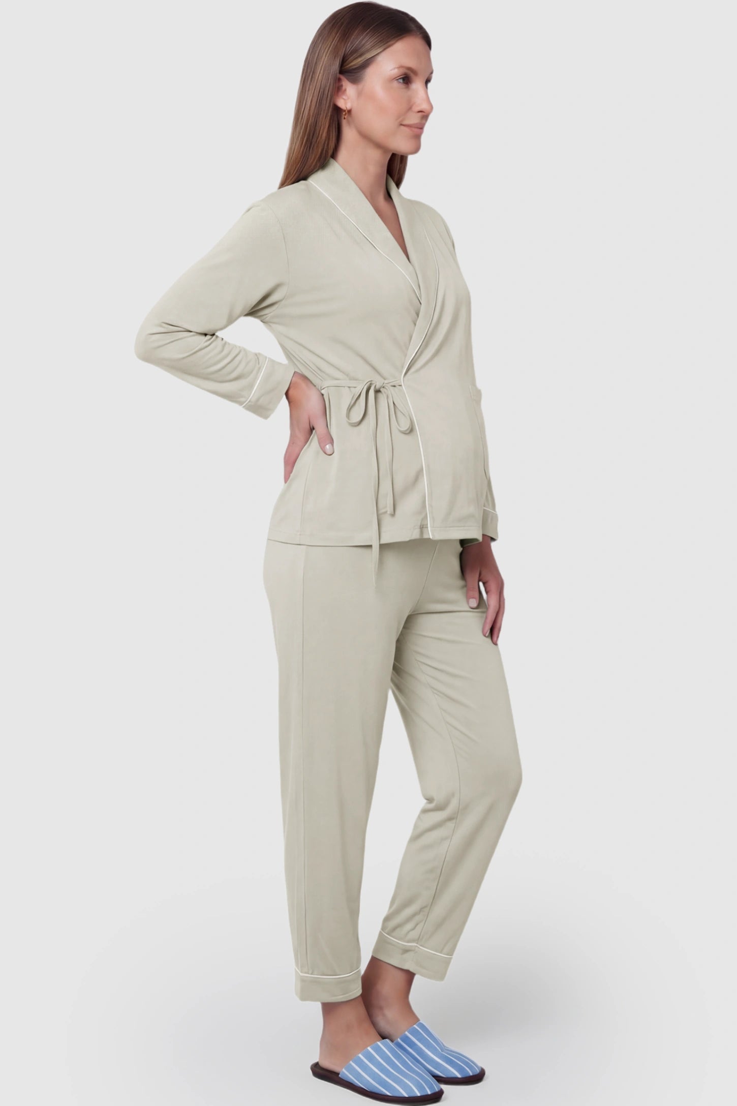 Cotton Wrap Front Long Sleeve Top Wide Leg Pants Maternity Sleepwear Cotton Wrap Front Long Sleeve Top Wide Leg Pants Maternity Sleepwear in light green featuring natural cotton fabric on a pregnant model showing side.