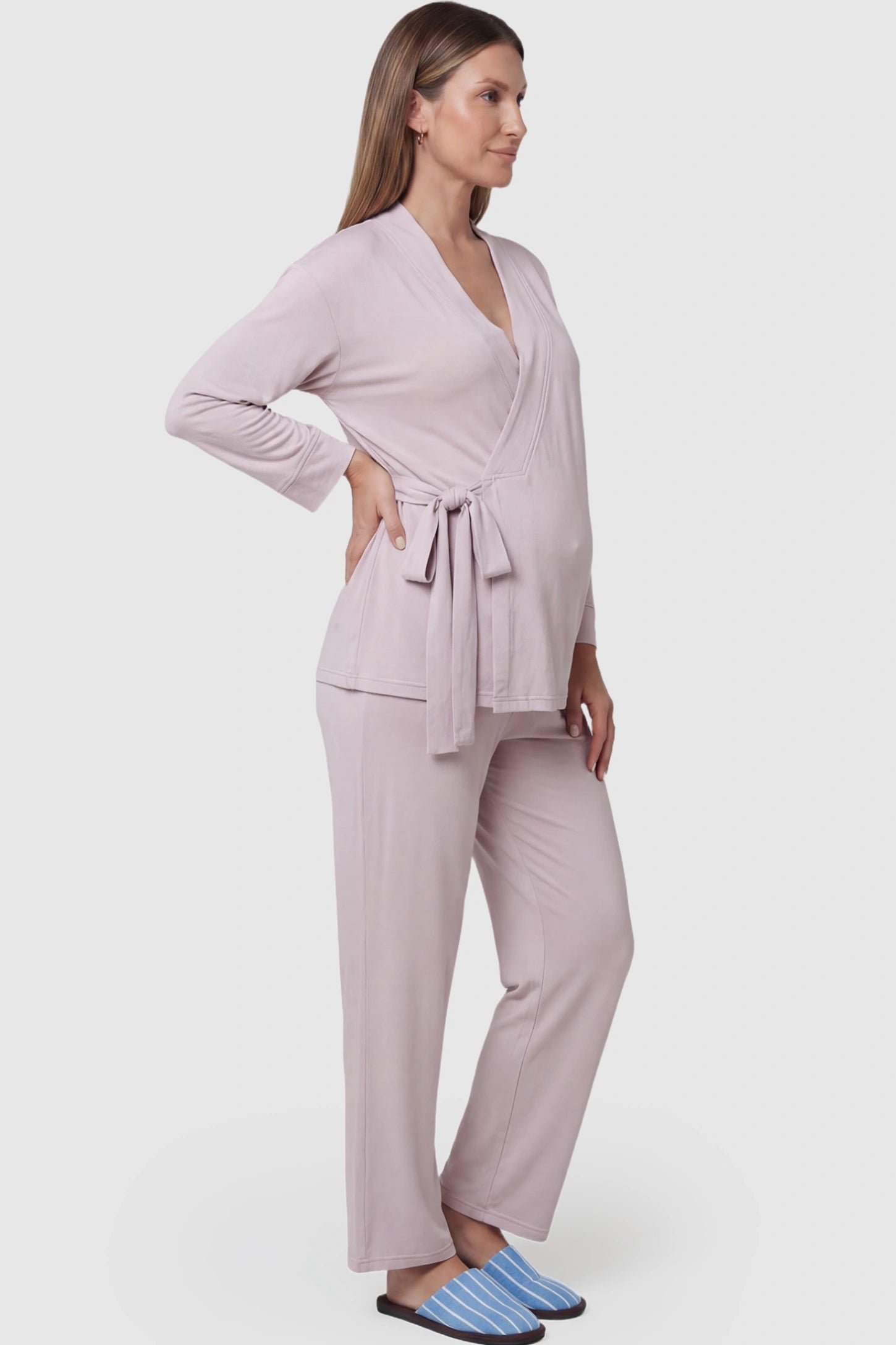 Cotton Wrap Front Long Sleeve Top Wide Leg Pants Maternity Sleepwear Cotton Wrap Front Long Sleeve Top Wide Leg Pants Maternity Sleepwear in light purple featuring natural cotton fabric on a pregnant model showing side.