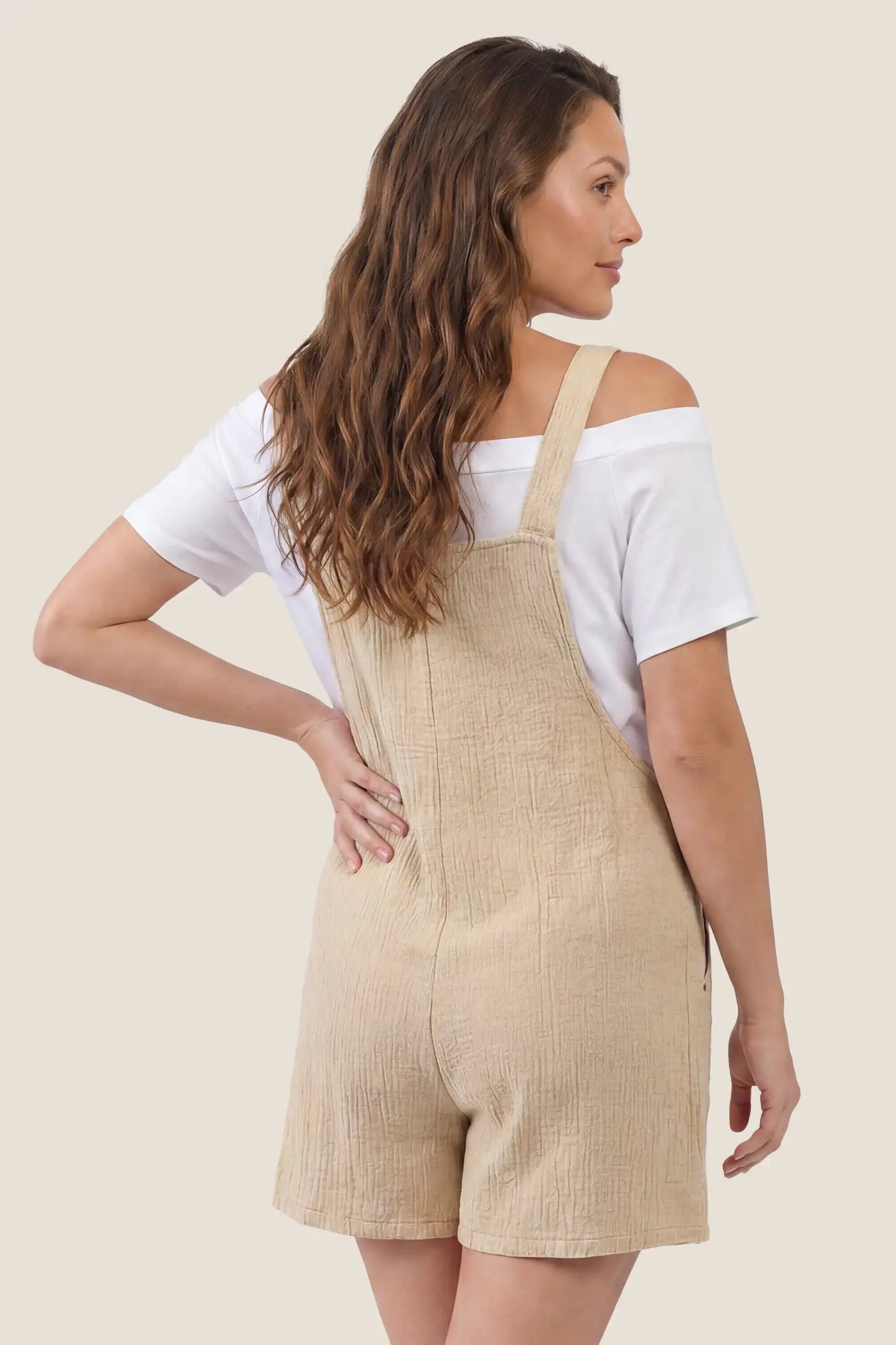 Knot Strap Front Pocket Maternity Romper Back view of beige knot strap front pocket maternity romper for maternity wear