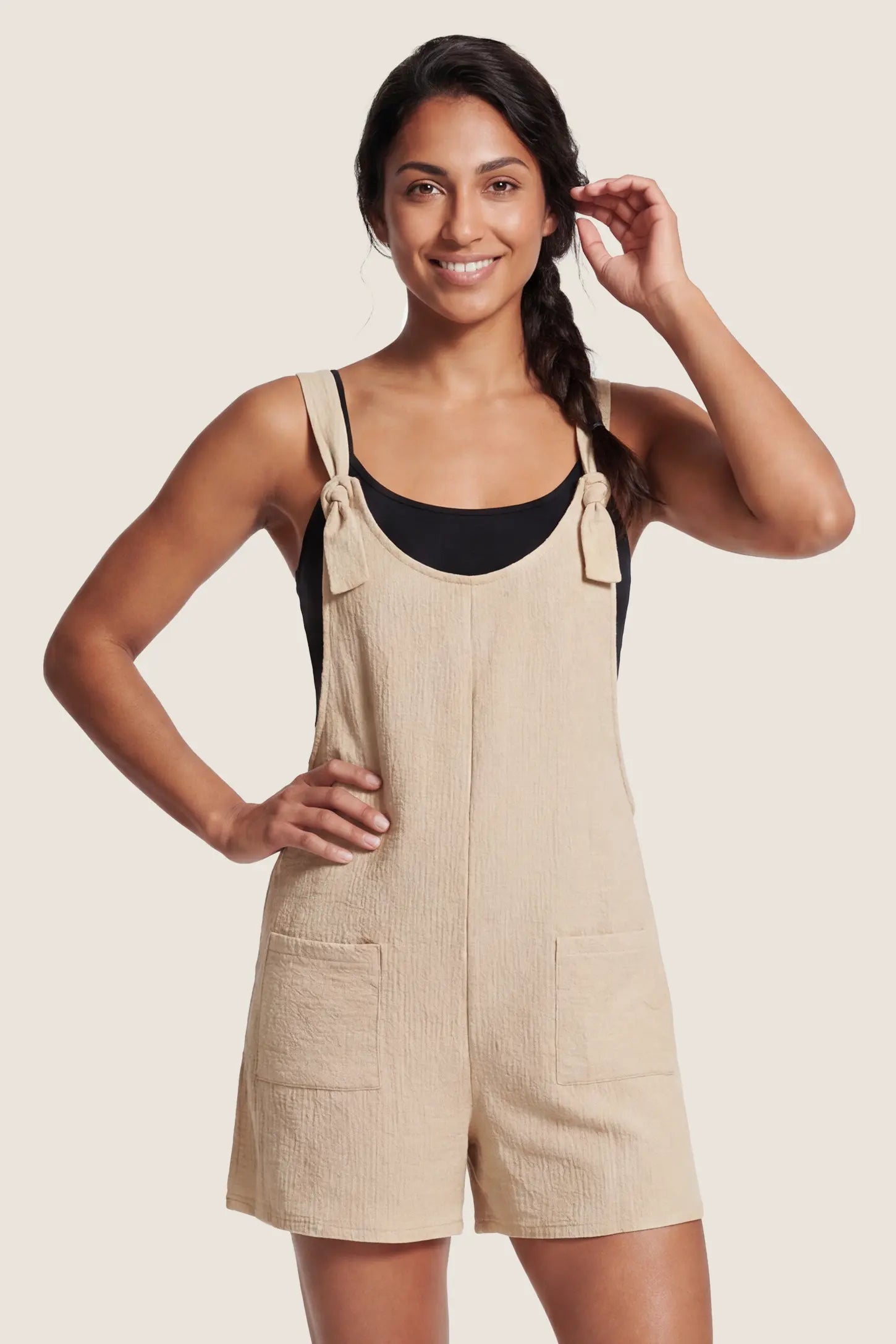 Knot Strap Front Pocket Maternity Romper Full body front view of beige knot strap front pocket maternity romper with pockets