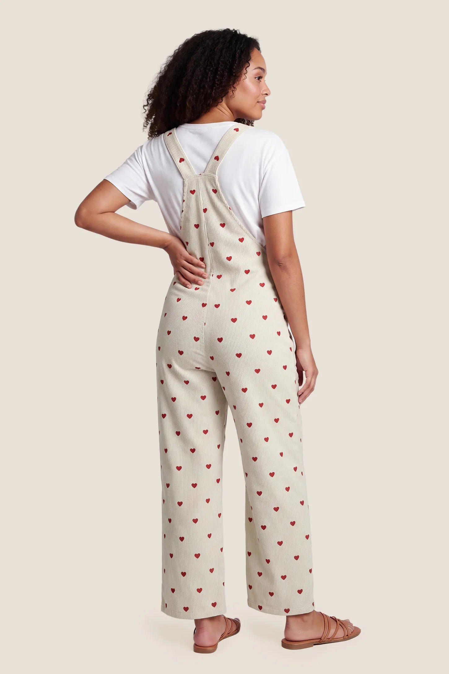 Pocketed Adjustable Maternity Overalls Back view of Pocketed Adjustable Maternity Overalls in Oat Cherry Heart.


