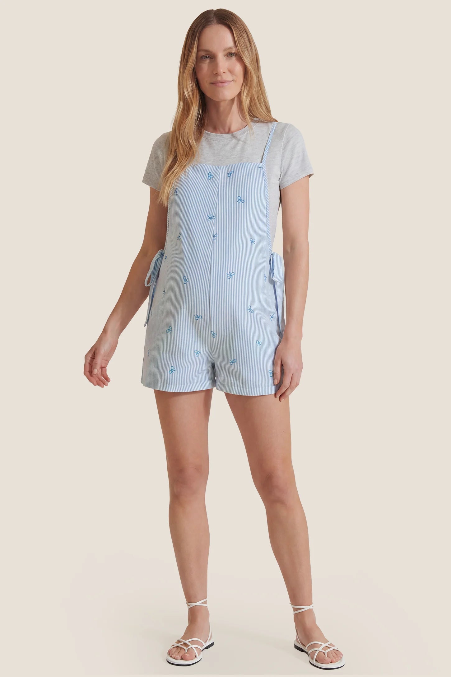 Side-Adjustable Maternity Jumpsuit Comfortable Pregnancy One-Piece Full-body view of Side-Adjustable Maternity Jumpsuit Comfortable Pregnancy One-Piece in Baby Blue.