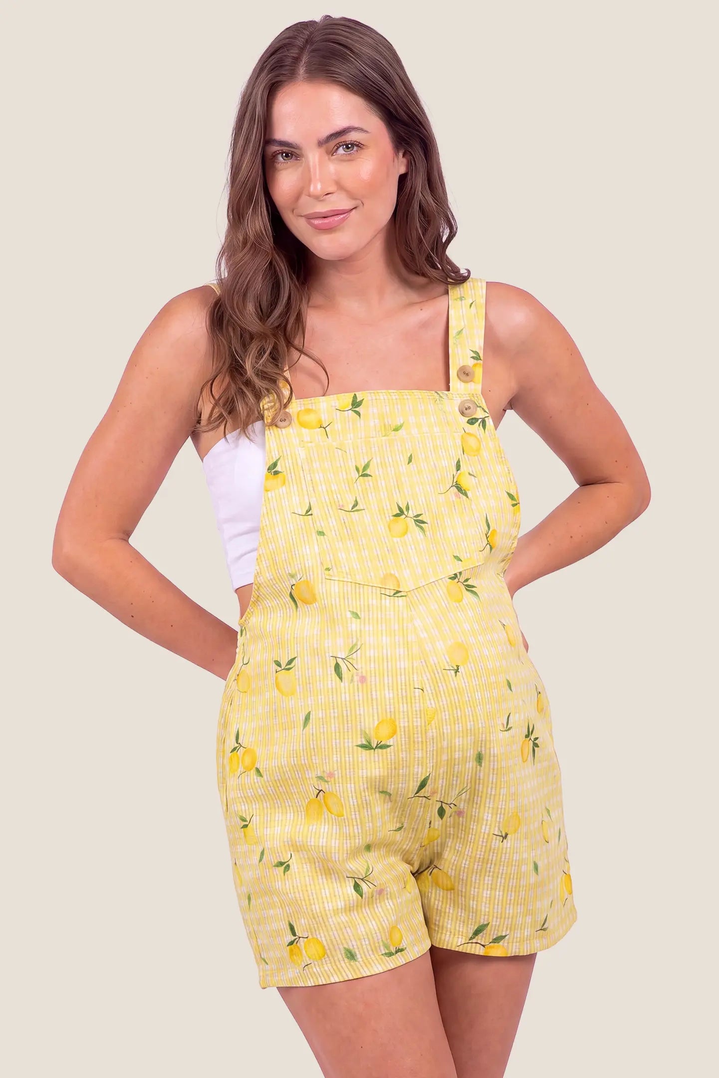 Sunny Day Adjustable Maternity Short Overalls Front view of Sunny Day Adjustable Maternity Short Overalls in Lemon Gingham
